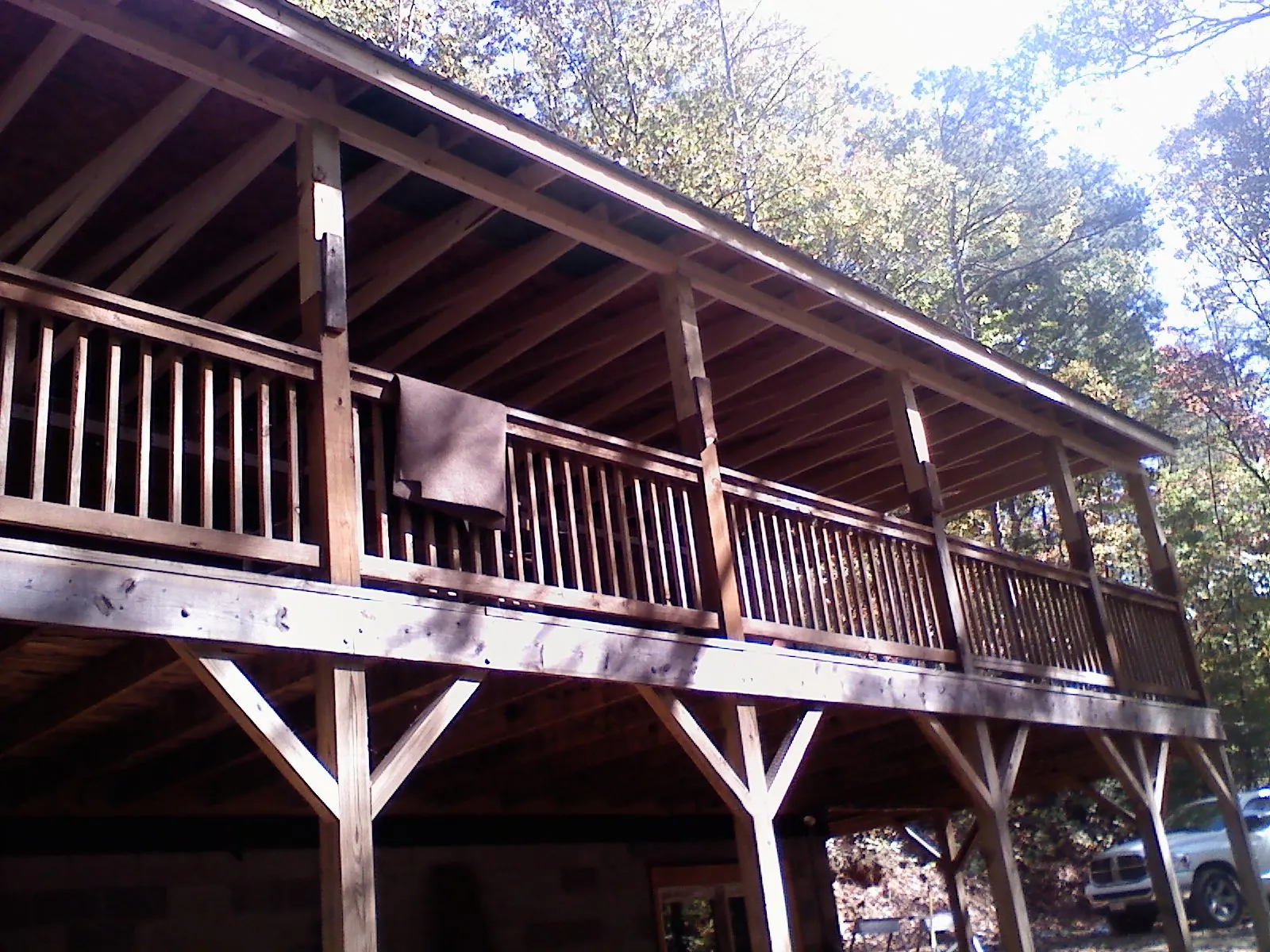 Timber framing under a new elevated porch and deck — Roof Leak Repair in Rocky Ridge by Roofing Brothers